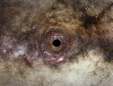 Rappresentazione artistica di un buco nero (fonte: ESA/Hubble, Digitized Sky Survey, Nick Risinger (skysurvey.org), N. Bartmann) (ANSA)