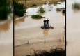 Strade inondate a Lentini, persone sull'auto (ANSA)