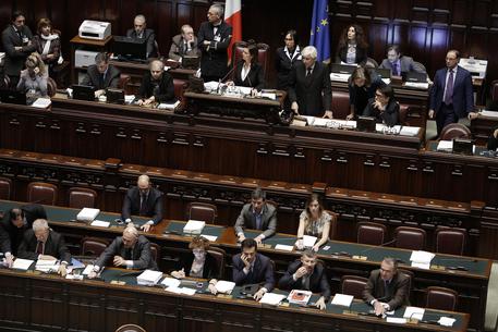 Banchi del Governo alla Camera durante il voto finale della legge di stabilita', Roma 30 novembre 2014. ANSA/GIUSEPPE LAMI © ANSA