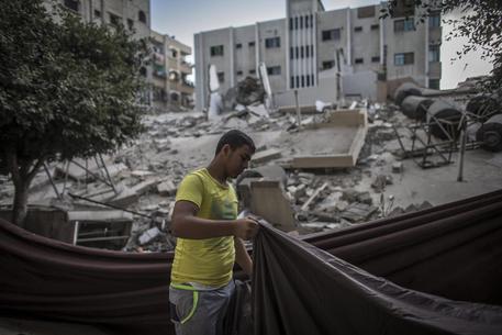 Distruzione a Gaza - Foto: EPA/OLIVER WEIKEN © EPA