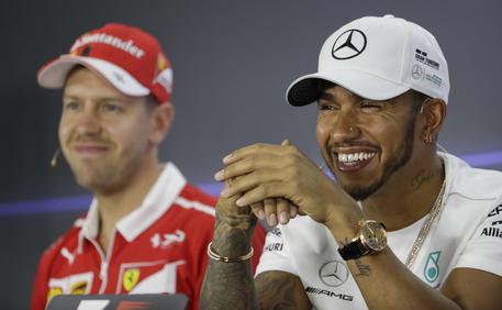 Lewis Hamilton,Sebastian Vettel © AP