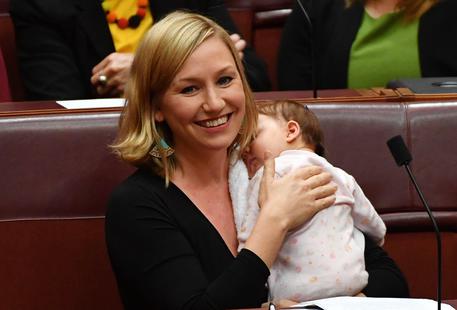 Greens Senator Larissa Waters first politician to breastfeed in the Australian parliament © EPA