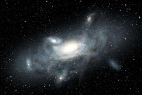 Rappresentazione artistica della Via Lattea quando era ancora una galassia molto giovane, composta da 5 piccole galassie, diverse fra loro in forma e dimensioni (fonte: James Josephides, Swinburne University,CC BY 4.0)