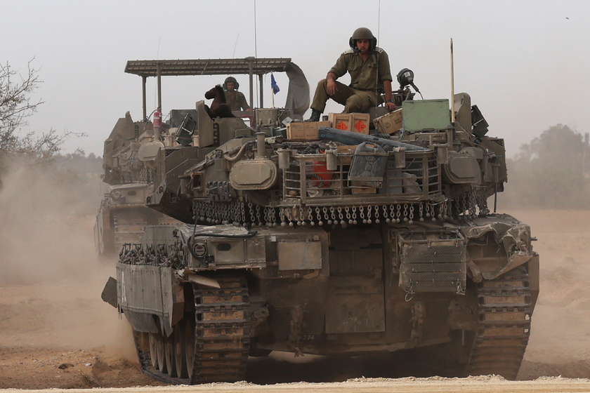 Israeli forces gather at the border with Gaza, southern Israel