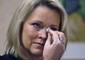 Former Boston television news anchor Heather Unruh holds back tears while speaking Wednesday, Nov. 8, 2017, in Boston, about the alleged sexual assault of her teenage son by actor Kevin Spacey in the summer of 2016 on Nantucket. ( © Ansa