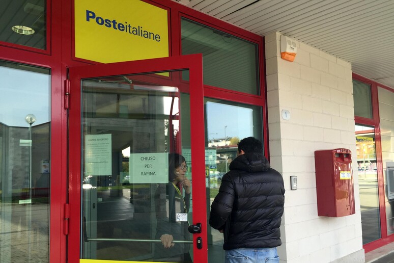 Un ufficio postale - RIPRODUZIONE RISERVATA