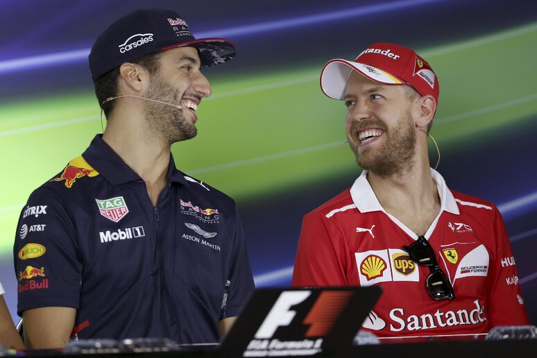Daniel Ricciardo e Sebastian Vettel © ANSA/AP