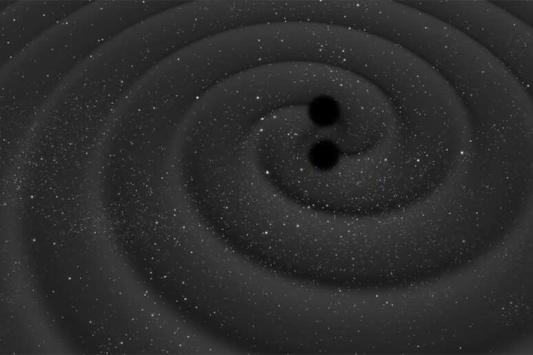 Le onde gravitazionali possono nascere dalla fusione di due buchi neri (fonte: ESA/C.Carreau) - RIPRODUZIONE RISERVATA