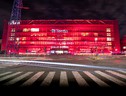 Il quartir generale di Terna illuminato di rosso nella Giornata contro la violenza sulle donne (ANSA)
