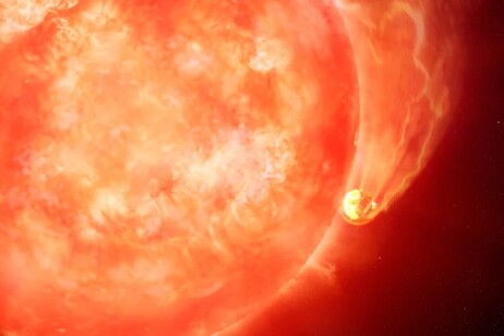 Rappresentazione artistica di un pianeta che viene divorato dalla sua stella (fonte: International Gemini Observatory/NOIRLab/NSF/AURA/M. Garlick/M. Zamani, CC BY 4.0)