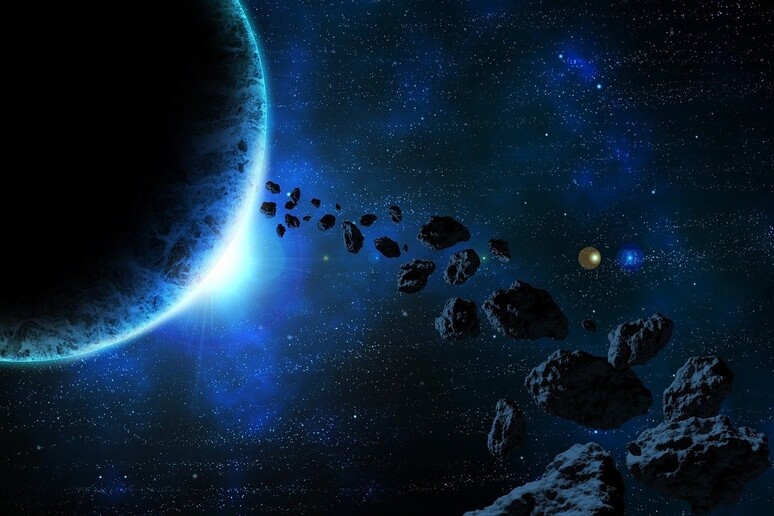 Rappresentazione artistica di asteroidi (fonte: UKT2 da Pixabay) - RIPRODUZIONE RISERVATA